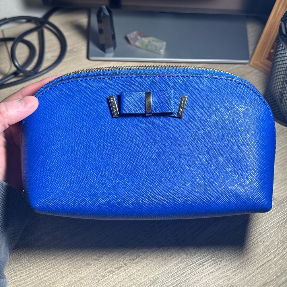 Brand new never used Royal Blue Leather Michael Kors Travel Pouch with a Bow 🎀